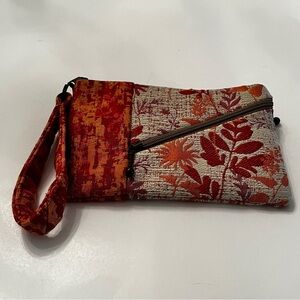 Maruca Wristlet Clutch Bag in Red and Orange Floral